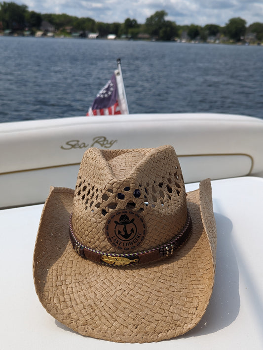 Photo of the Lake Cowgirl Signature Cowboy Hat with Feather Band (Tea Colored) – Photo taken on a boat on Lake Minnetonka.