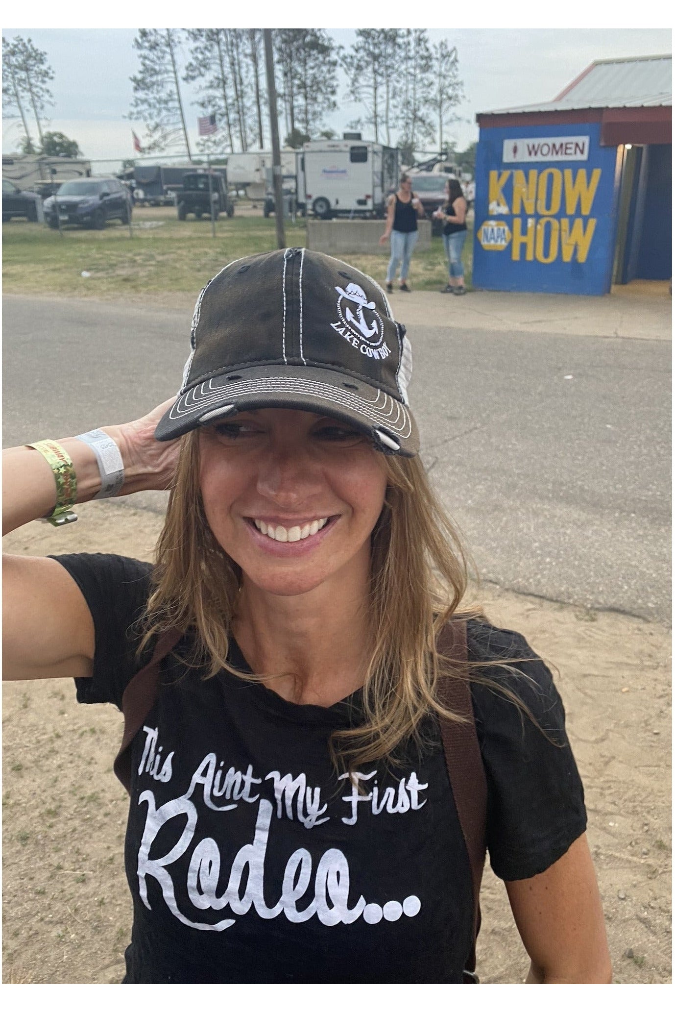Lake Cowboy Female Fan wearing a Lake Cowboy Sportsman's Trucker Hat (Black) at Lakes Jam in Brainerd, MN