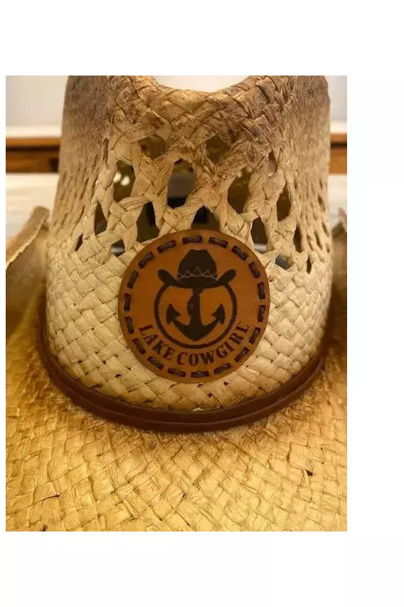 Closeup photo of the Lake Cowgirl Logo that adorns the front of the Cowboy Hat.